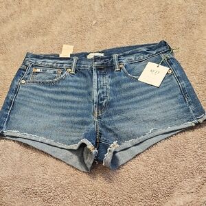 AE77 Jean Shorts with Frayed Hem and Medium Wash